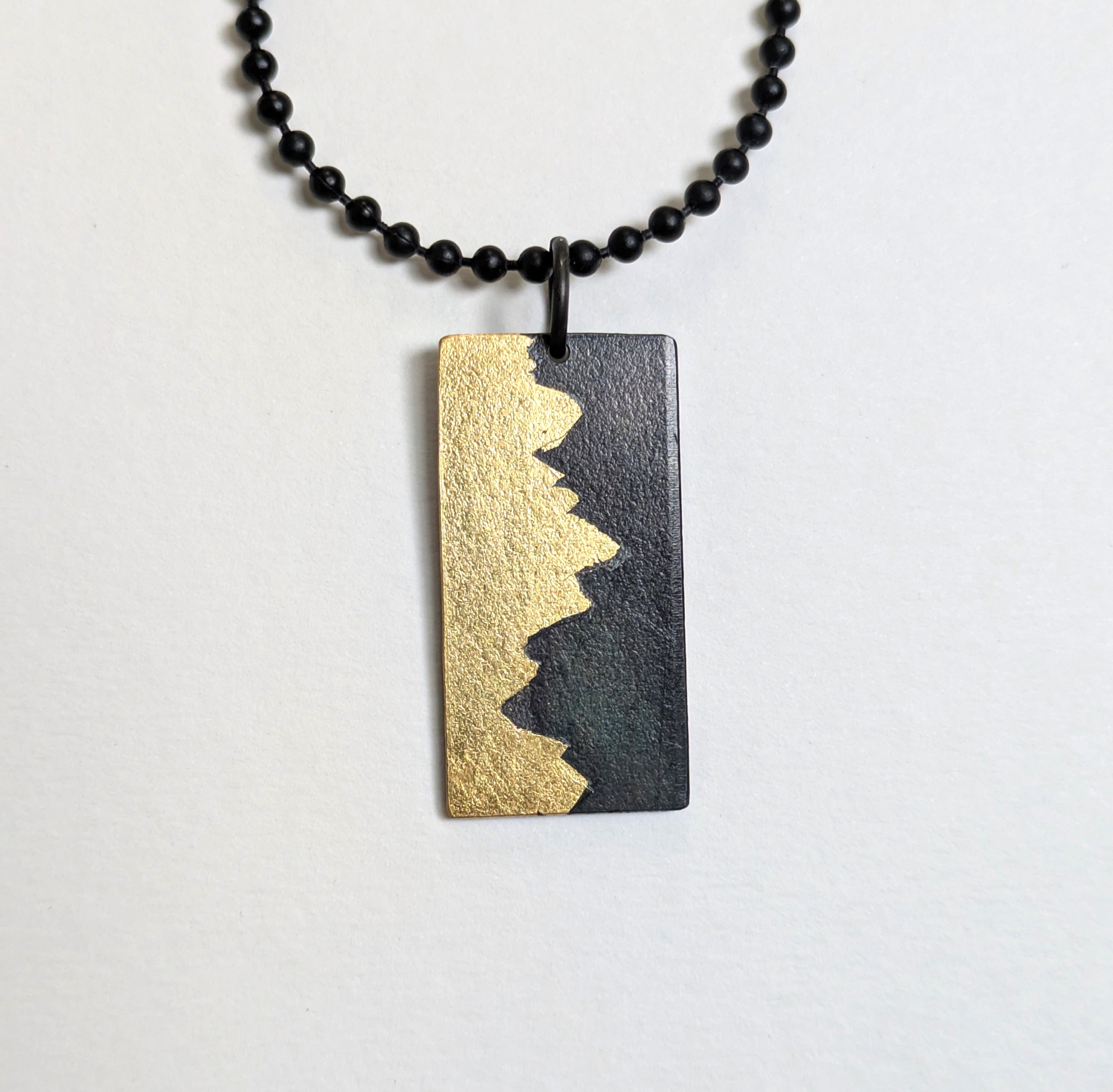 Sunset Behind Mountain 24k Gold on Steel Pendant