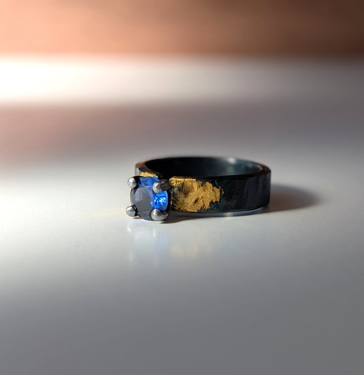 1ct Lab Sapphire Gilded Hammered Steel Band