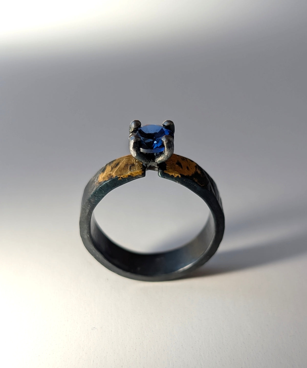 1ct Lab Sapphire Gilded Hammered Steel Band