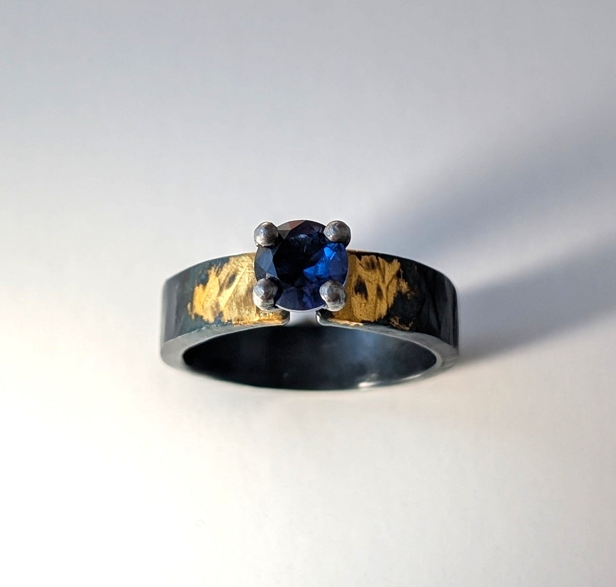 1ct Lab Sapphire Gilded Hammered Steel Band