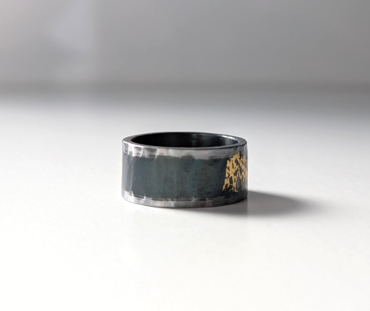 Distressed 24k Gold on Hammered Steel Band