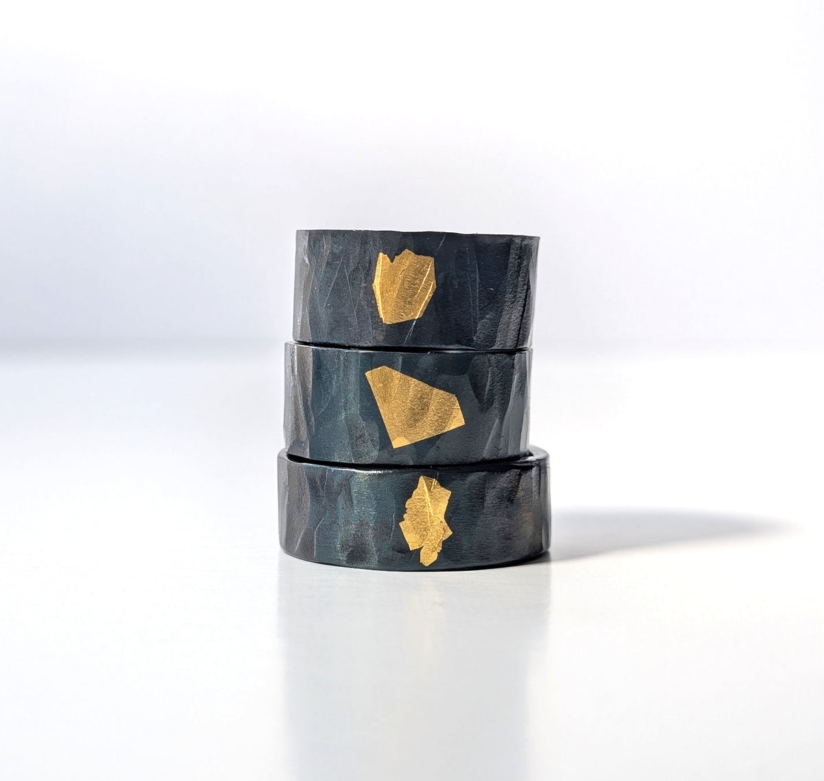 Abstract 24k Gold Gilded Hammered Steel Band